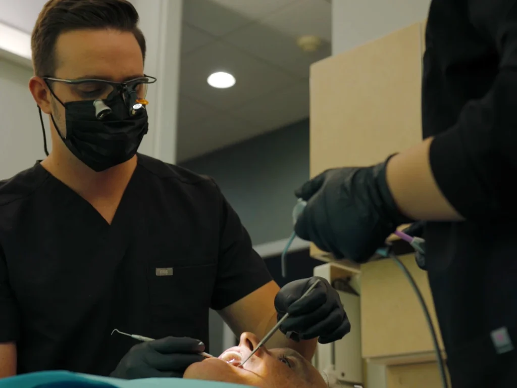 Dr. Duerr treating a patient in the dental chair | Locally-owned dentist in Wilmington, NC